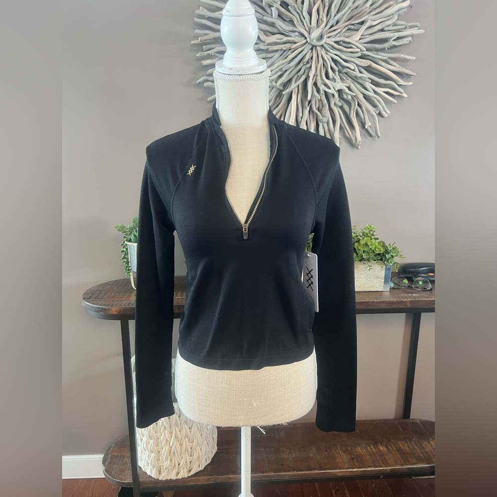 NWT Rhône Breakaway Seamless 1/2 zip top in black